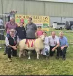 Aoife Cunniffe with her Galway Ram winning Champion Sheep of the show 2025 in Mountbellew, receiving the Denis Crehan preputal trophy with members of the Crehan family